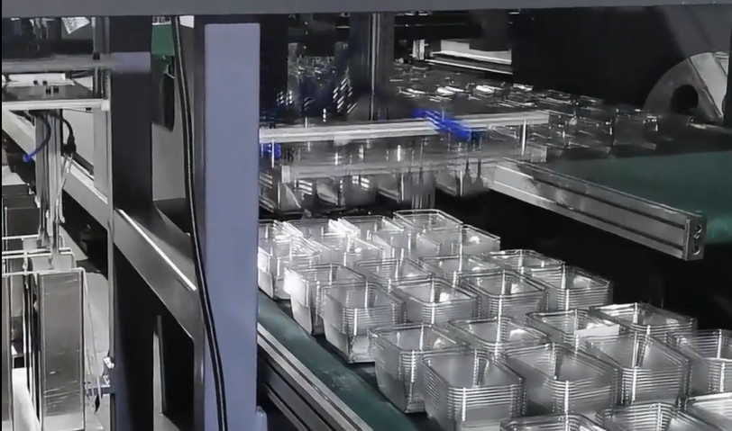 See How Our Machine Automatically Stacks Plastic Containers & Places Water-Absorbing Pads